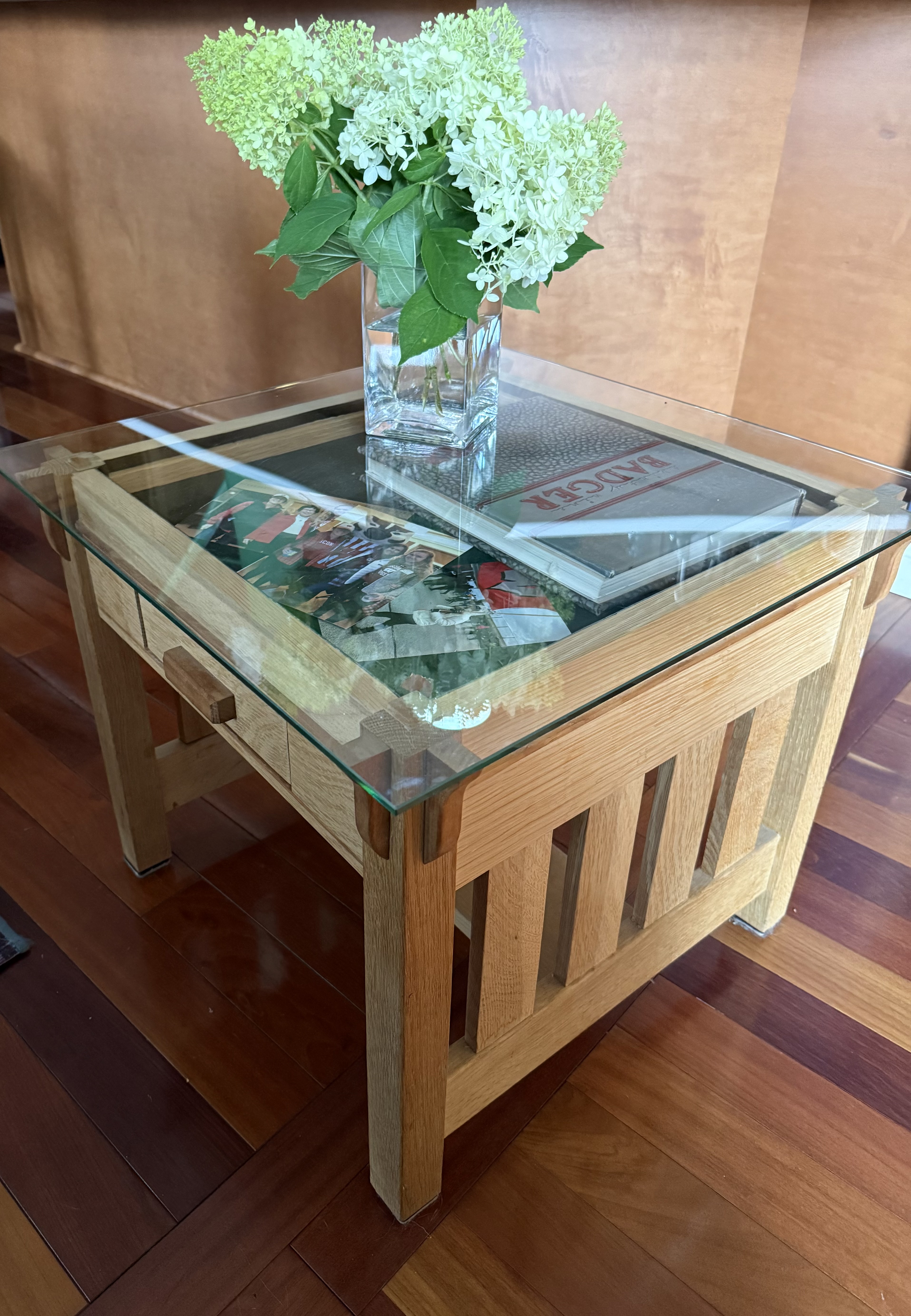 Mission end table with glass top, flowers and shelf display