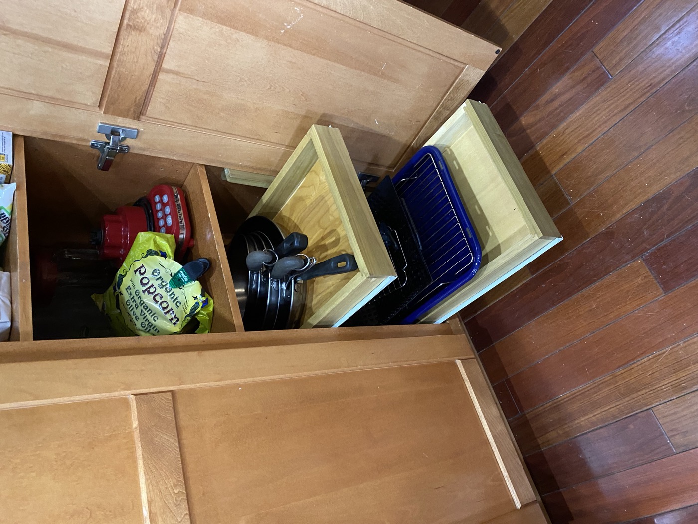 Custom built-in cabinetry with pull-out shelving compartments